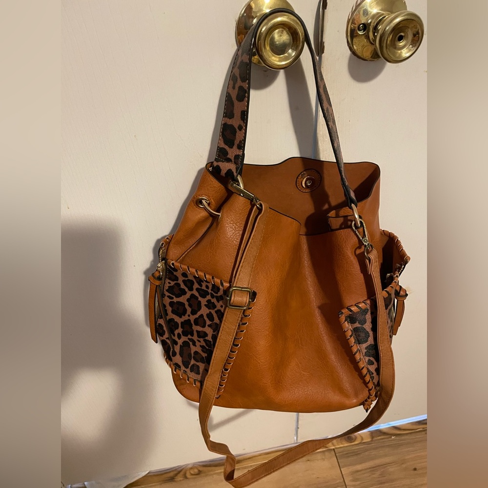 Brand new, never used, imitation leather purse.